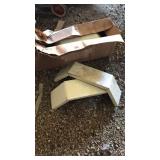 Box of lawn mower ramps
