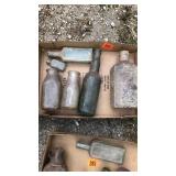 Old milk bottles and glassware