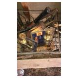 Wire Basket full of Door knobs, torch, and