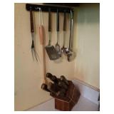 Chicago cutlery knife set, utensil on wall