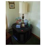 End table, lamp, plate, candle, picture, box