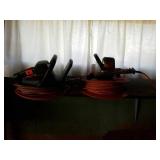 2 electric hedge trimmers and extension cords
