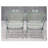 Two Wrought Iron Rocking Patio Chairs