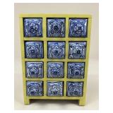 Apothecary or Spice Cabinet with Ceramic Detail