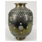 Moroccan-style pierced brass vase circa 1960