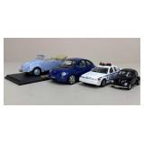 Model Volkswagen Beetles & NYPD Cruiser