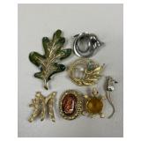 Brooches / 7 pc