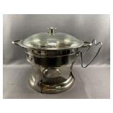 Metal Covered Chafing Dish On A Raised Stand