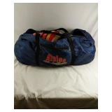 Alpine duffle bag full of Caps