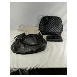 3 various sizes of purses with a wallet
