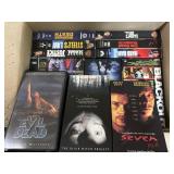 A collection of horror and thriller VHS tapes