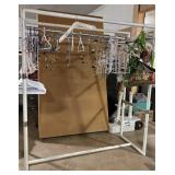 Large clothing rack, includes all hangers -