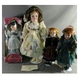 Four Beautiful Porcelain Dolls All With Stands