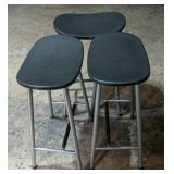 Three Black Plastic Saddle Style Ikea Bar Stools
