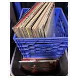 Milk crate and bin filled with vinyl records