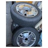 4 tires on aluminum rims - size in photos
