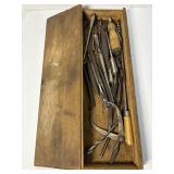Assorted drill bits and more in vintage crate