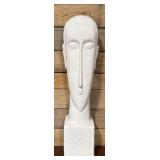 White ceramic face figure