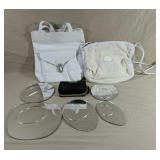 Purses A Wallet And Different Shaped Mirrors For
