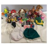 Mixed toy and doll collection featuring a variety