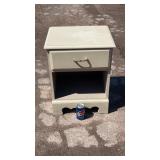 Painted wooden nightstand featuring a single