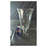 VaseClear glass vase with a flared top and