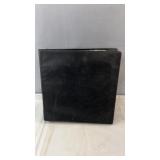 Hockey trading card collection in binder labeled