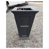 Large black decorative planter Contains