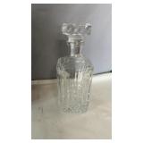 Clear cut glass decanter with matching stopper,