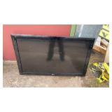 LG flat screen TV, no power cord, approximately