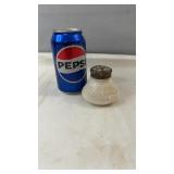 Small white vintage salt shaker with embossed