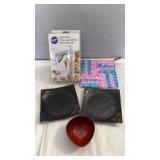 Mixed household lot including Wilton cookie press