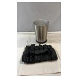 Stainless steel wastebasket paired with
