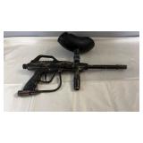 Paintball marker with camouflage finish, includes