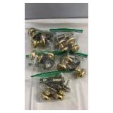 Group of brass door knob sets with internal