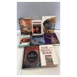 Collection of hardcover and softcover books