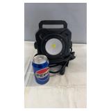 Portable LED work light with built-in handle and