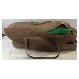 Portable playpen in carrying/storage