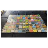 Mixed Pokï¿½mon trading card collection featuring a