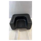 Black plastic booster seat with stackable design