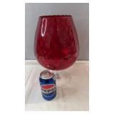 Large red glass pedestal vase with flared rim and