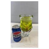 Decorative green art glass vase with a flared rim