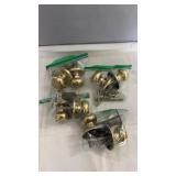 Brass door knob hardware set including multiple