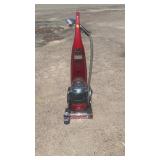 Bissell upright carpet cleaner with onboard hose