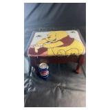 Winnie the Pooh themed wooden footstool with