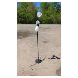 Three-Light Floor LampBlack floor lamp with