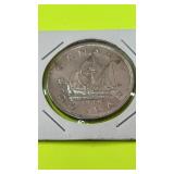 Canadian 1949 dollar coin featuring the iconic