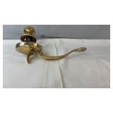 Brass-tone door hardware set including a