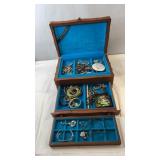 Jasco Wooden jewelry box filled with a variety of