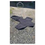 White metal valet stand with quilted furniture